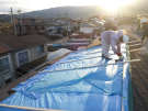 工事着工～既存大屋根部（南面）屋根材撤去及び下地コンパネからルーフィング貼り